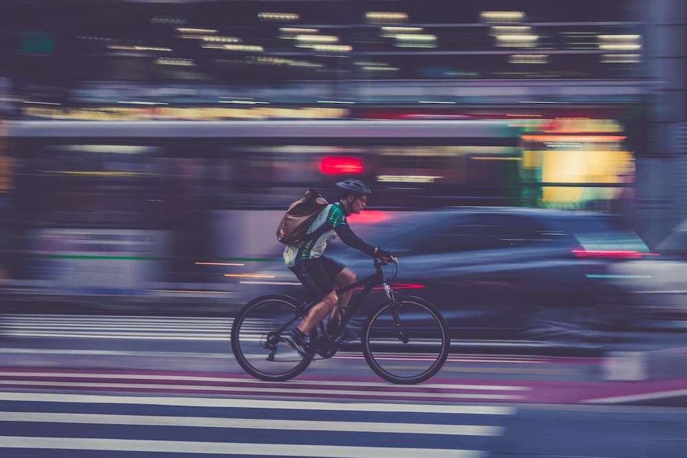 biker riding through Los Angeles streets who might need a bike accident attorney