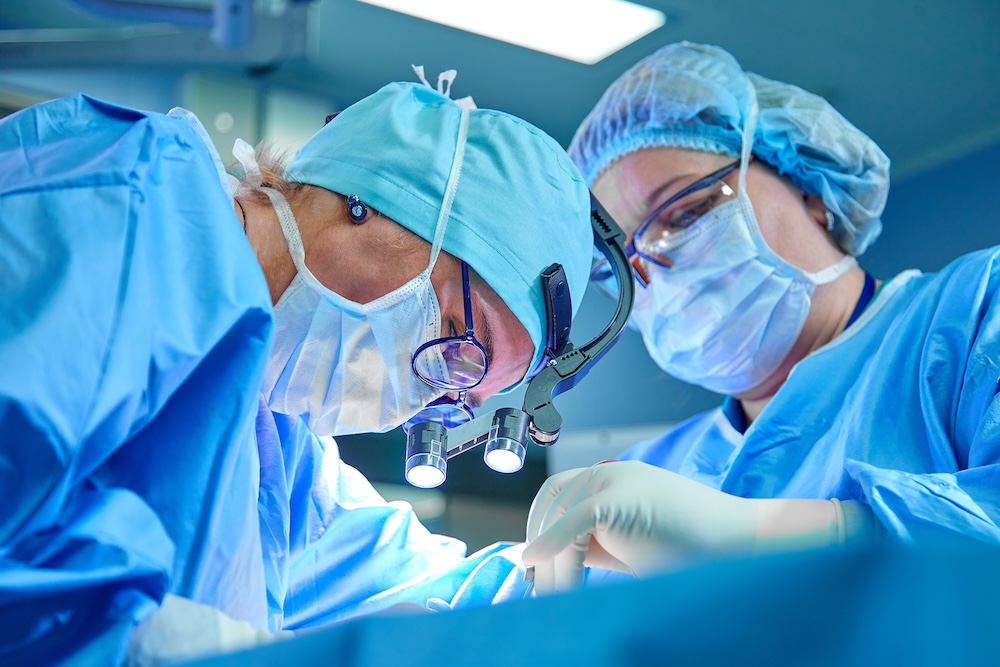 surgeons performing a second surgery